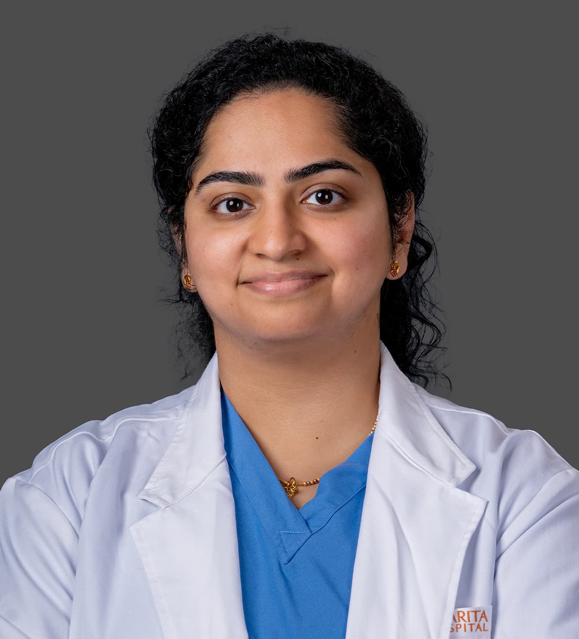 Dr. Dimple Elina Thomas