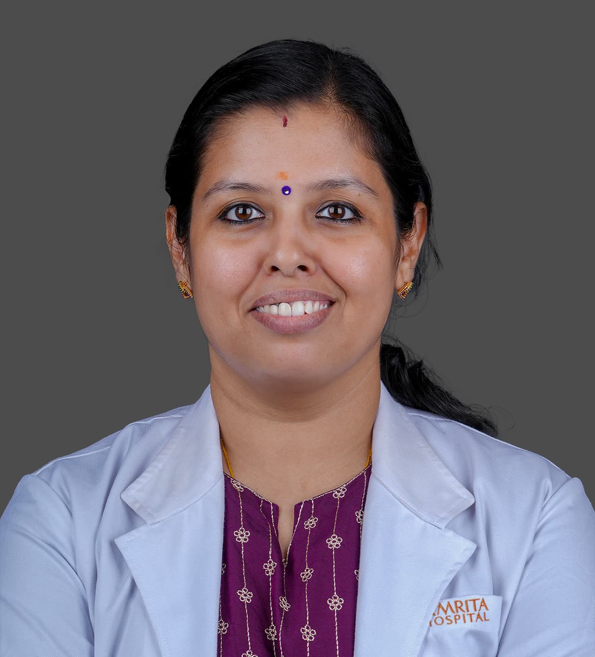 Dr. Lakshmi K P